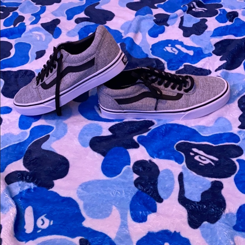 Grey black and white vans